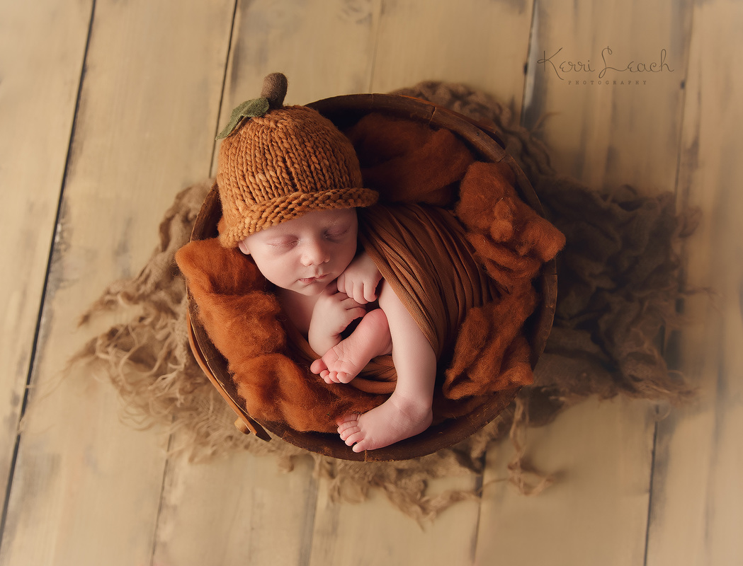 Kerri Leach Photography-Evansville IN newborn photographer-Newborn poses-Newborn bean bag-Newborn photography-Newborn fall props